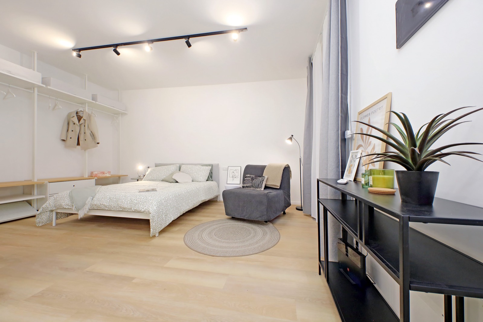 Zona notte open space loft ricettivo Roma dopo ristrutturazione